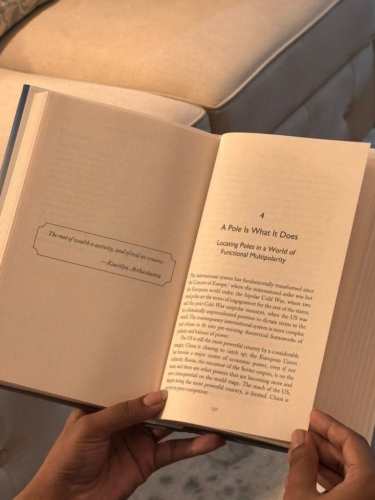 The book open at Chapter 4, A Pole Is What It Does